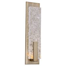 Bold geometric kitchen precise angles in the pendant lights, hexagonal wall tiles, and island play against the rich woodgrains of the cabinets. Design Leading American Artisan Crafted Lighting In 2021 Decorative Lighting Design Recessed Lighting Polished Steel