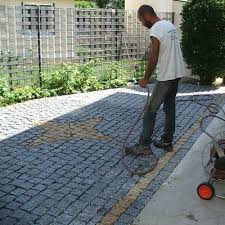 Pose De Paves En Granit Sur Une Terrasse Pave Granit Terrasse Pave Amenagement Jardin