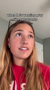 Nic Running in Grey Sweatpants Across Beds