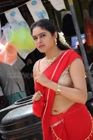 She wears this beautiful saree slightly flaunting her hips and navel with a contrast brocade blouse. Arthanaari Movie Heroine Arundhati Sexy Navel Photo 01 475324 Actress Arundhati Gallery