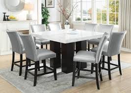 Sold by ami ventures inc. Camila Brown Rectangular Marble Top Dining Set W 6 Chairs Black Pu Ivan Smith Furniture