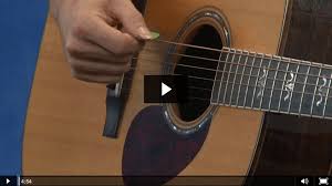 Holding the pick between the tips of your index finger and thumb is the best way to acheive this. Learn How To Hold A Guitar Pick And Strum The Strings