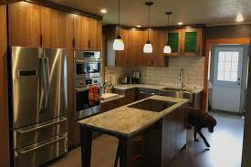 This depends on the type of material used to make it. Flat Panel Walnut Kitchen Germansen Woodwork And Design