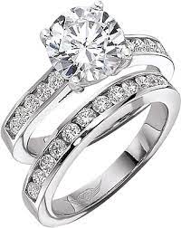 This sophisticated ring setting has diamonds in a line around the band. Flyerfit Round Brilliant Channel Set Diamond Engagement Ring 5198ser