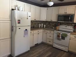 Lowe S Caspian Cabinets Custom Kitchen Cupboards Diy Kitchen Cabinets Off White Kitchens