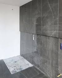 1200x600 Large Format Tiles With A Break To Create An Ip Rated Led Detail On This Feature Wall Florim Cerim Largeformat Large Format Tile Feature Wall Tiles