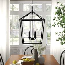 Exposed bulbs illuminate from in the center of a open box. Israel 4 Light Lantern Geometric Chandelier Reviews Birch Lane