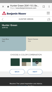 House shutters were used to cover fragile windows during storms and block out the sun to keep temperatures cool during the hot summer months. Pair Hunter Green Shutters With A Dreamy Blue Front Door Green Front Doors Green Shutters Hunter Green