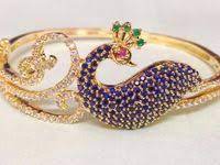 beautiful gold matt finish bangles with floret lata design bangle studded with pink co gold bangles design gold jewellery design necklaces gold bangles indian