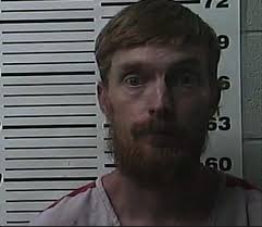 Man allegedly stabbed in driveway attack