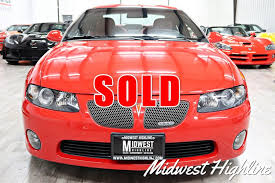 Image result for Medium Red Mica 2004 Pontiac