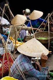 Vietnamese Food Photograph Vietnamese Women With Traditional Conical Hat In Hoi An Vietnam By Fototrav Print Vietnamese Recipes Photographer Fine Art America