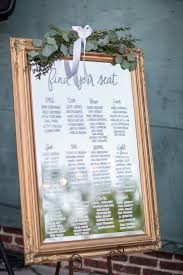 Wedding Reception Seating Chart On Mirror With Gold Frame