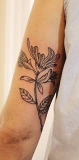 Honeysuckle Tattoo Pretty I Like An Idea Of A Honey Suckle Tattoo Because It Reminds Me Of Being In The Garden In F Honeysuckle Tattoo Tattoos Sleeve Tattoos