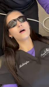 Bella got her braces off and snapped a pic with Dr. Becker! Congrats Bella  you're smile looks amazing!