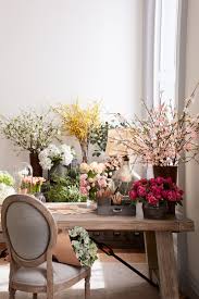 Floral home decor designers have created this colorful centerpiece with roses, hydrangeas, fruit, and artichokes. Fake Flowers Used To Be Considered Tacky Not Anymore The Washington Post