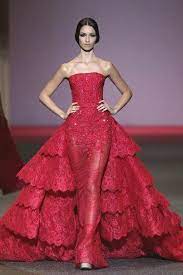 See more ideas about michael cinco, michael cinco couture, gowns. Grosshandel Michael Cinco Red Ballkleid Abendkleider Lace Appliques Sweep Zug Sheer Tull Kleid Mit Abgestuften Ruschen Strapless Formal Women Gown Von Blissbridal 174 62 Auf De Dhgate Com Dhgate