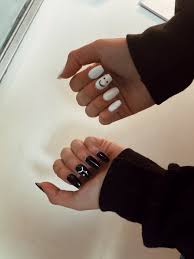 Pin On Nails The sheer, pink base coat on her oval nails are topped off with the palest yellow dots that have been turned into smiley faces with tiny black eyes and mouths. pin on nails