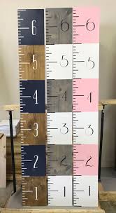 We have been using just a plain piece of wood for the past several years and my oldest got too tall for it, so it was time to get another one. Navy Brown Growth Chart Wooden Growth Chart Ruler Height Chart Baby Gift Kid Room Boy Nursery Boy Diy Baby Furniture Baby Room Diy Boys Room Diy