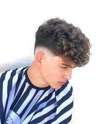 Curly hair can be difficult to manage, but picking the right haircut will help. 15 Trendy Haircuts For Men 2021 Styles Low Fade Curly Hair Men Haircut Curly Hair Haircuts For Curly Hair