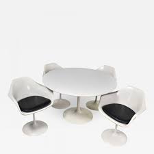 Check out our white tulip chairs selection for the very best in unique or custom, handmade pieces from our dining chairs shops. Contemporary Shells Tulip Style White Fiberglass Swivel Chairs And Table By Umanoff