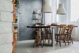 Your communal room stock images are ready. Open Modern Dining Room With Communal Table And Industrial Lamps Stock Photo Picture And Royalty Free Image Image 85134373