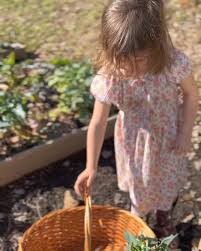 It's cold outside…BUT that's not going to stop baby Braelyn from eating  some fresh broccoli in the garden! Bridgette thinks we even picked enough  for soup! 🥦