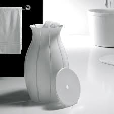 The attractive satin pewter finish fits any décor and will transform any space or laundry room into a chic area. Ninfea Modern Sculptural Laundry Hamper