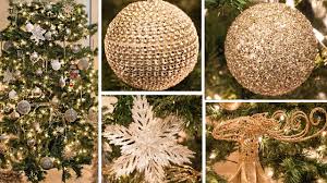 A silver & gold flocked christmas tree decorated with ribbon, silver and gold christmas balls, owl ornaments, gold deer antlers and icicles! Decorate With Me Christmas Tree How To Gold White Champagne Youtube