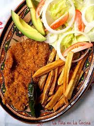 Grease the baking tray with vegetable oil and arrange the milanesas in the tray. Milanesa De Res Beef Milanesa La Pina En La Cocina