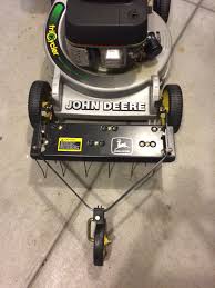 Cutting too deep in removing thatch will damage the grass and hamper its growth. Deere Bm22339 Thatcher Accessory My Tractor Forum