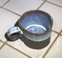2019 Cost Plus World Market brown ceramic mug with blue ...