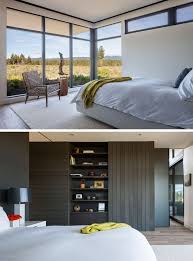 This main bedroom's inviting seating area consists of an armless loveseat and two rattan lounge chairs under a bay window that provides a spot to read, relax and enjoy the stunning views of the backyard after a long day. High Desert Modern By Deforest Architects Contemporary Interior Design Modern Master Bedroom Bedroom Design