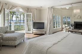 Master Bedroom With Sitting Area Fireplace Double French Doors And A Water View 7 500 Sq Ft Hampto French Doors Interior French Doors French Doors Bedroom