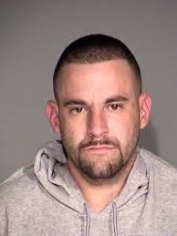 Indy man arrested after elderly, retired cop robbed