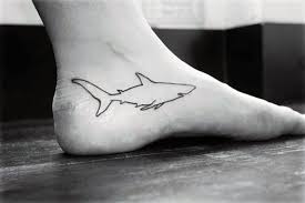 Off the coast of south africa a great white shark breaches the surface to surprise a seal. Simple Shark Line Tattoo Novocom Top