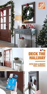 Deck The Hallway This Holiday Season With High Mighty Wall Hangers Add A Mirror And Wreath Above You Holiday Event Decor Christmas Open House Holiday Decor
