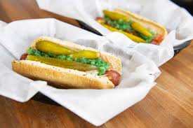 Before and after shots of someone who never tried the ted's burger sauce on a double bacon cheeseburger. San Antonio S Best Hot Dogs Wrigleyville Grill