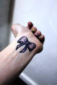 Placing the bow tie ribbon tattoo on the wrists, neck, or even legs the bow tie tattoos appeal to those who are ready to move forward and leave behind a past they have finally come to terms with. 100 Terrific Bow Tattoos On Wrist