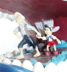 While pinocchio spends the night in stromboli's troupe. Disney Enesco Traditions Figur Jim Shore Pinocchio Monstro Mit Gepetto Und Pinoccho Gepetto Im Wal Disney Shop Store In Deutschland