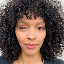 Start off by giving your entire hair a black look. How To Cut And Style Curly Bangs According To A Stylist Naturallycurly Com