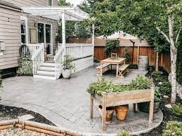 Add style with these patio decorating ideas. Creating A Cozy Cottage Style Backyard Oasis Designed For Entertaining Our New Stamped Concrete Patio Rain And Pine