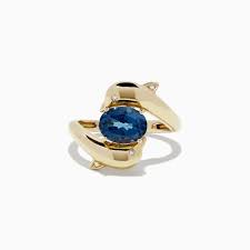 A spectacular imperial topaz weighing 8.60 carats. Effy 14k Yellow Gold Blue Topaz And Diamond Dolphin Ring 2 17 Tcw Effyjewelry Com