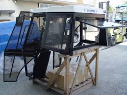 Trattori usati a prezzi convenienti— 2.205. Cabine