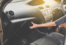 Insert your hand into the glove box with the palm side facing the door and disengage the locking mechanism. Hand Open Glove Compartment Box Inside Modern Car Stock Photo Picture And Royalty Free Image Image 94384529