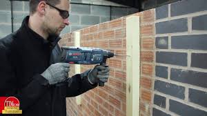 All you need to do is drill a hole into the mortar and put in a wall anchor. How Do I Use And Install Hammer Fixings Into Masonry Or Brick Step By Step Guides Youtube