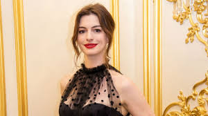 Anne jacqueline hathaway is an american actress, voice actress, and singer, known for roles such as playing andrea sachs in the devil wears prada , selina kyle/catwoman in the dark knight rises , and fantine in the 2012 film les misérables. Anne Hathaway Reveals Name Of Second Child Entertainment Tonight