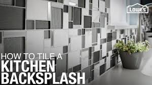 Glass tile kitchen backsplashes have a cool, sophisticated look. How To Tile A Kitchen Backsplash Youtube