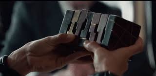 You will need to manipulate parts and send a ball into the container. Tomb Raider Puzzle Box Room Escape Artist