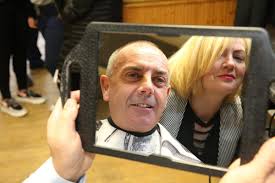 A man has a close shave to 'raze' £1,200 for charities close to his heart